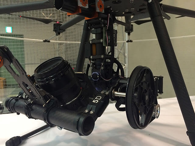 【写真】神戸清光EXPO2015 島内エンジニア製新型UAV（ドローン）「Magpie1200A」本体下部に取り付けたカメラ